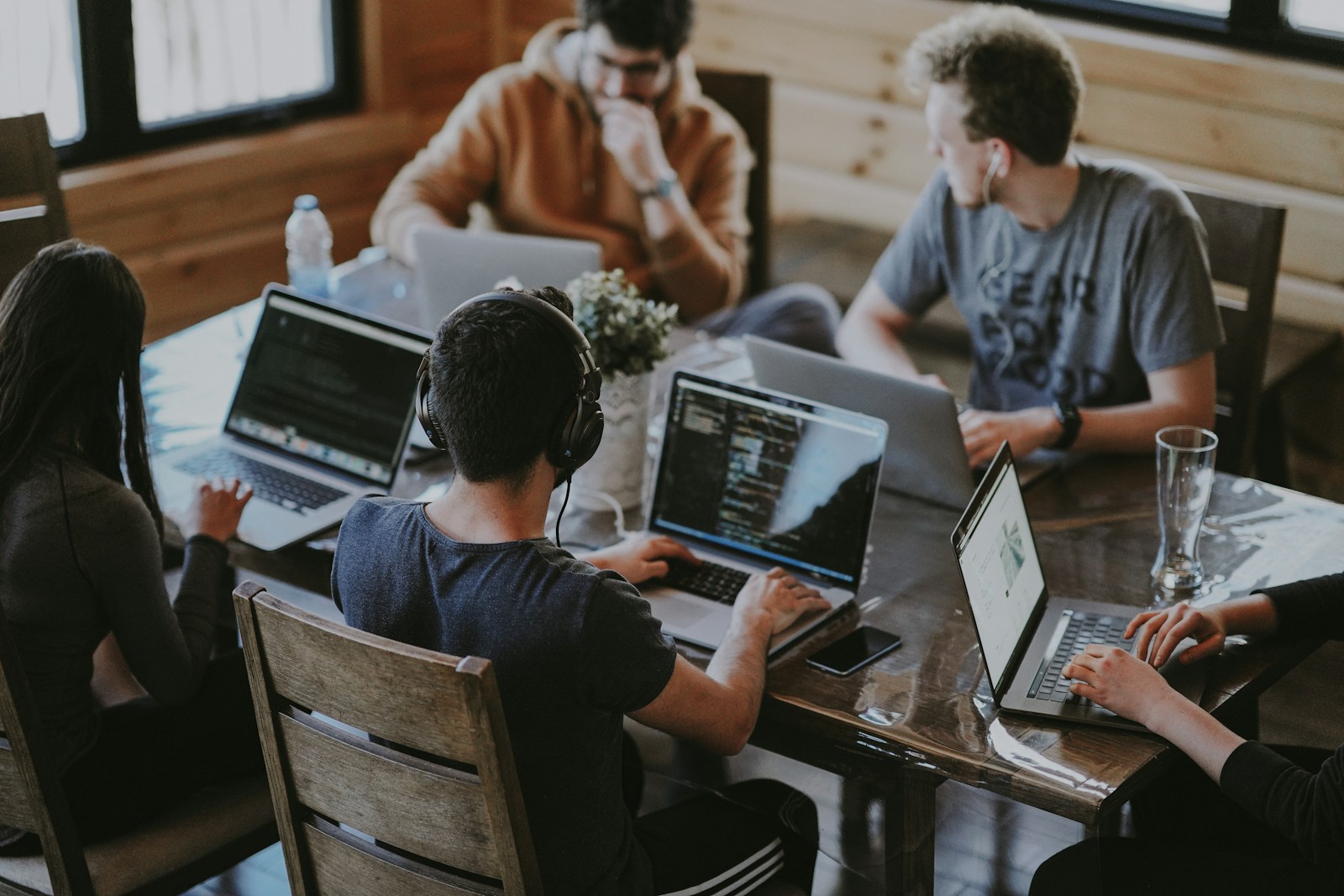 A diverse creative team collaborating around a table
