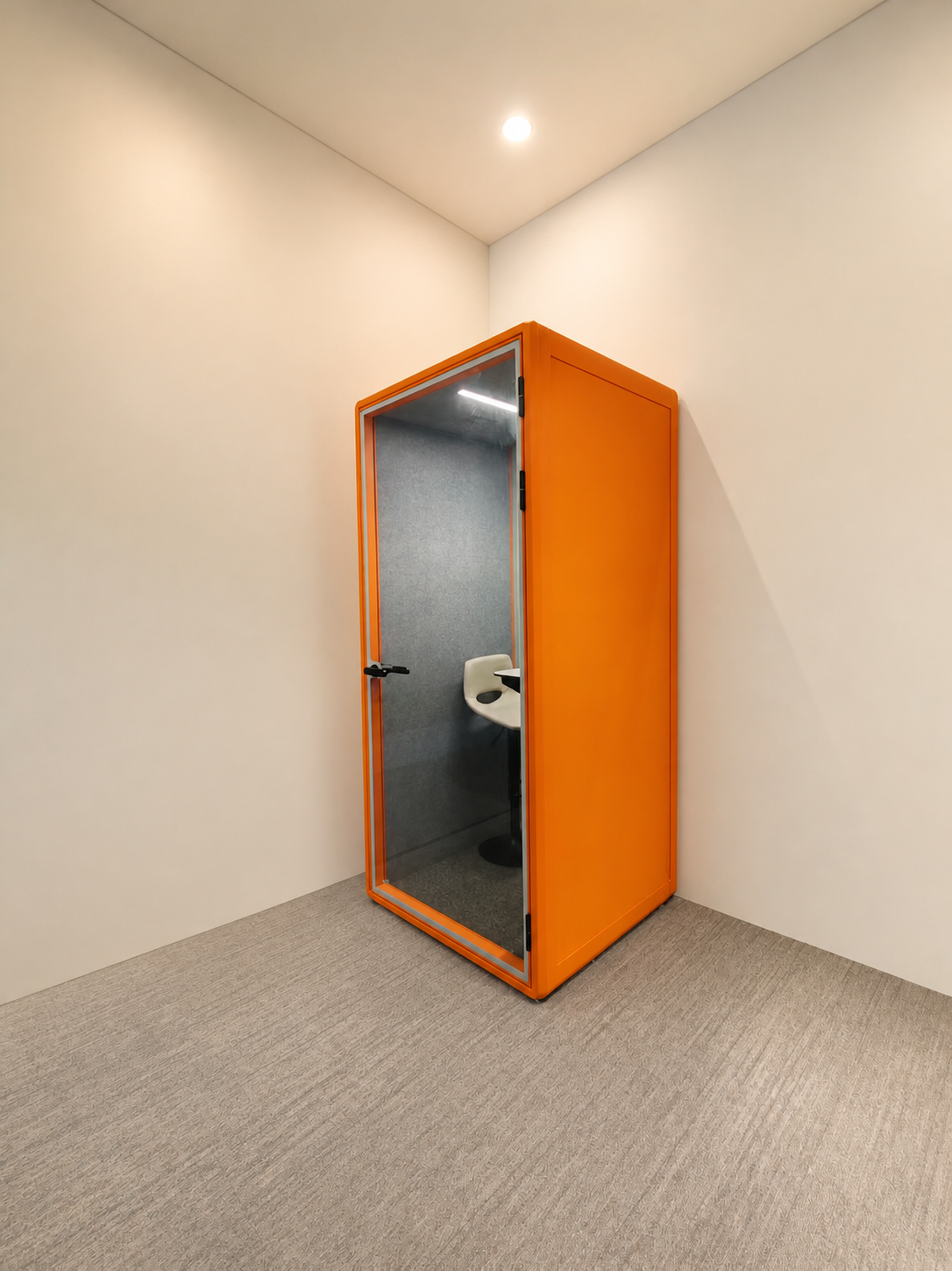 Orange Xypods private pod in a clean interior setting